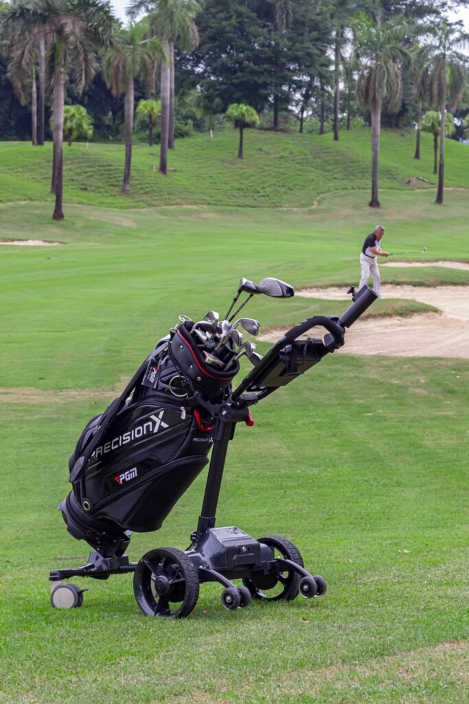 Hands-free electric golf caddy with follow mode and safety sensors