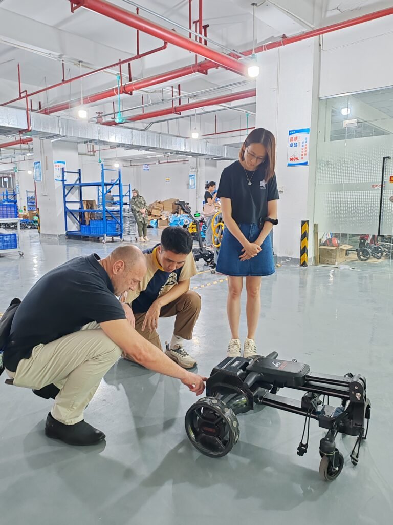 B2B Buyers inspecting terrain-ready golf trolleys