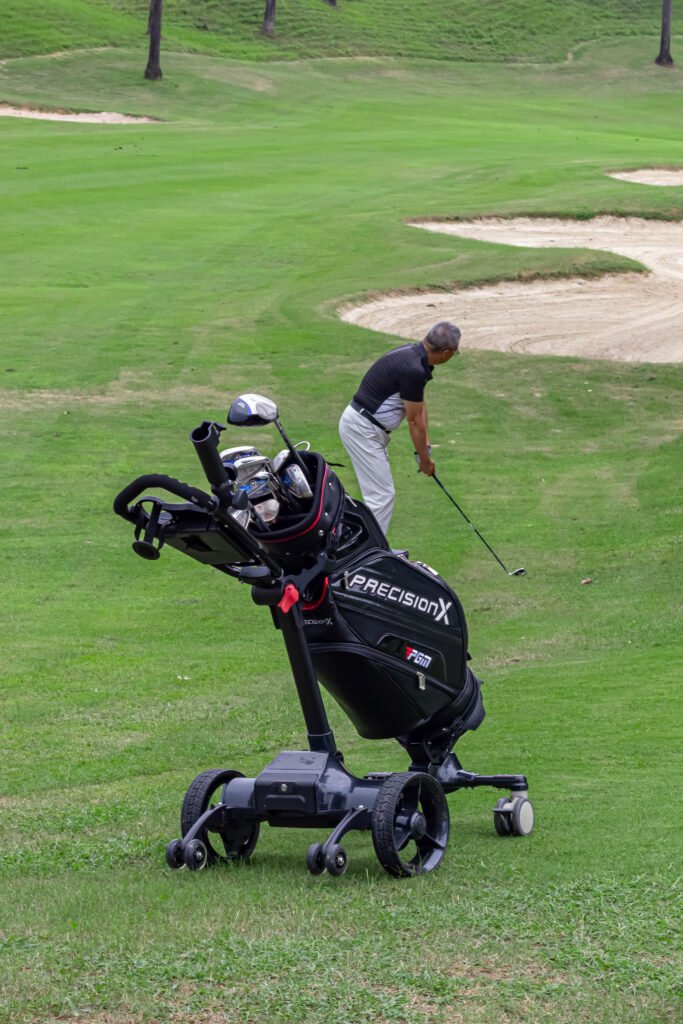Follow Me Smart Robotic Golf Trolley climbing slope on a golf course