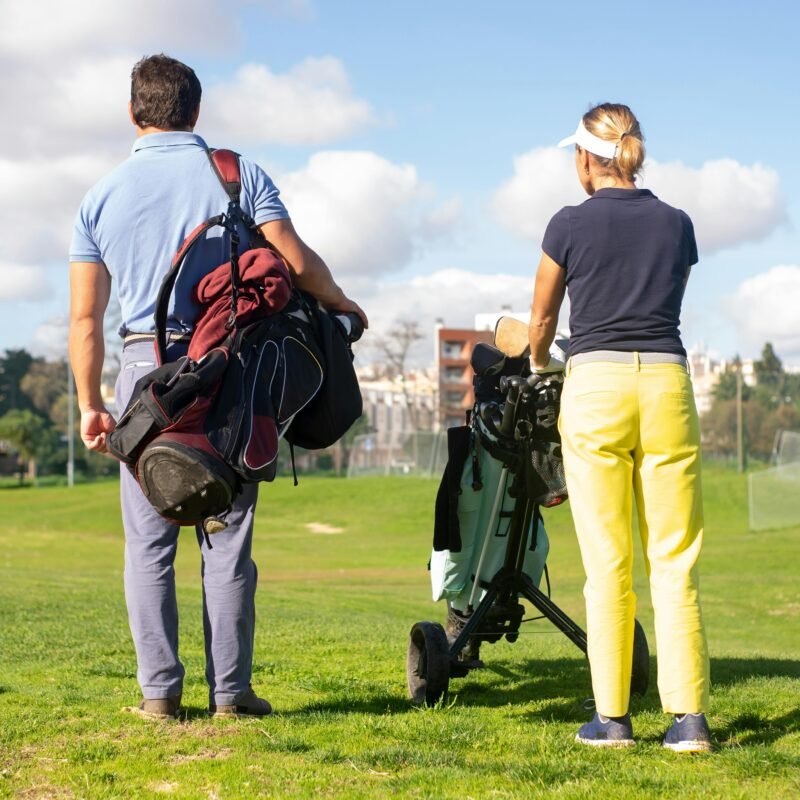 Golf trolley parked by clubhouse after game